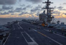 US military says it hit and ‘disabled’ Iranian-flagged Vessel in Gulf of Oman American aircraft carrier USS George Bush deployed near the Strait of Hormuz