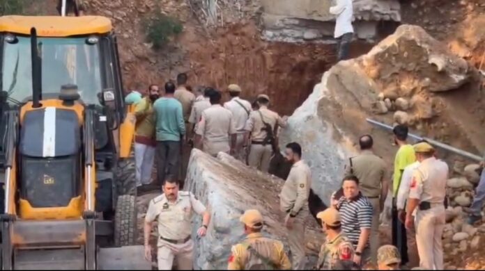 Scene at the site of collapse of under-construction bridge in Jammu today