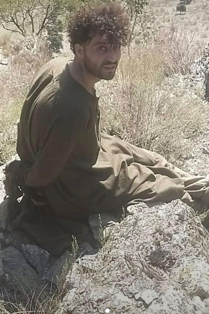 An infiltrator from Pakistan captured by Afghan forces